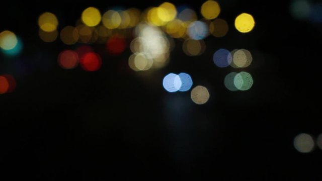 Bokeh alias background is a circle of glowing colors of night.