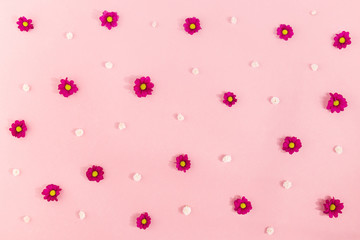 Background of small flowers on pink