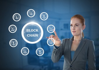 Businesswoman touching blockchain graphics