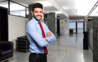 Handsome manager in his office