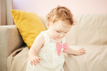 Fototapeta premium beautiful baby playing in the room