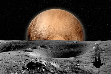 Astronaut on moon surface. Mars in background. Elements of this image furnished by NASA