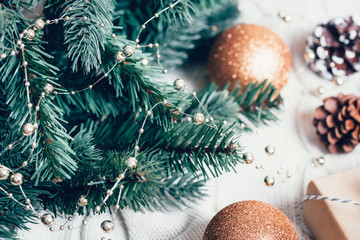 Composition with Christmas decorations fir tree on white background