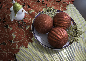 Three Red Christmas Balls and a Bird