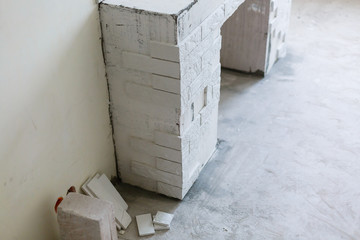 Indoor diy project building fireplace in the house finishing touches selective focus