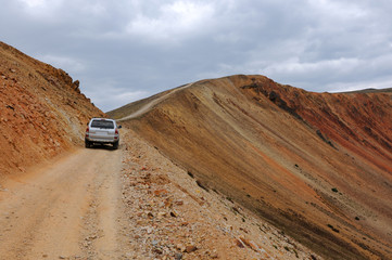 Mountain Road - A 4X4 vehicle driving on the most dangerous section of Webster Pass, Colorado, USA.