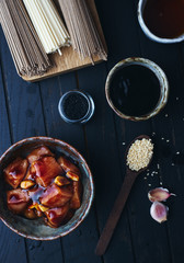 Raw chicken fillet marinated in teriyaki sauce for asian wok Chinese food