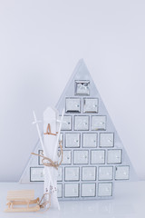 Christmas tree shaped advent calendar. Minimalist decor 