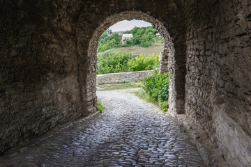 Gate in Stephen Bathory Tower, one of the towers of old city walls in Kamianets Podilskyi, Ukraine