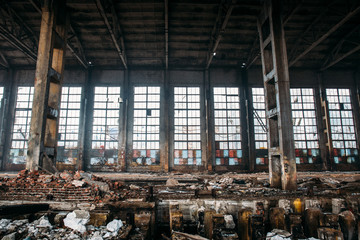 Abandoned industrial creepy warehouse, old dark grunge factory building