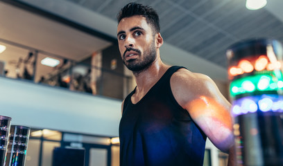 Sportsman with lights around during reaction time training