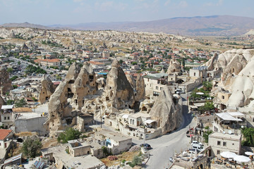 Naklejka premium Goreme village, Turkey. Rural Cappadocia landscape. Stone houses in Goreme, Cappadocia.