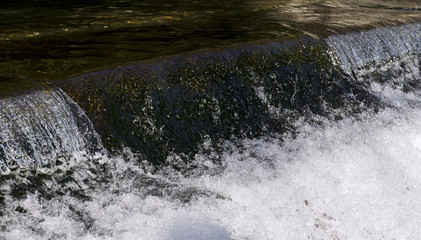 Water flowing from the dam