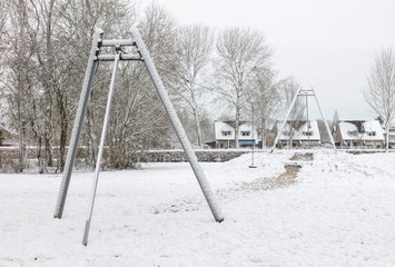 Playground in kindergarten for children in winter