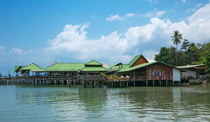 Fototapeta na wymiar Houses on stilts in the fishing village of Bang Bao, Koh Chang, Thailand