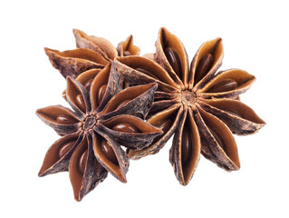 Star anise heap isolated on white background closeup