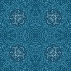 Seamless doodle drawing. Blue floral ornament. Ethnic motives. Zentangl. Design, yoga, meditation