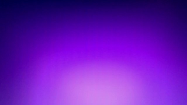 Abstract background with violet and pink blur movement.