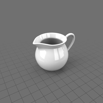 White creamer with handle