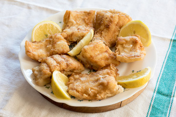 Breaded and fried Salted cod with lemon