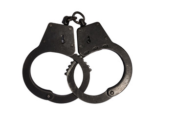 black metal handcuffs with small scratches on white background