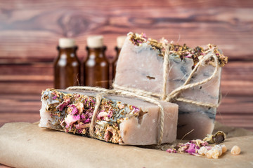 Pink handmade soap on a brown background