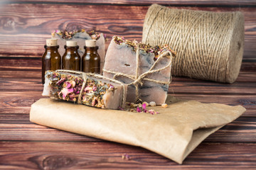 Pink handmade soap on a brown background