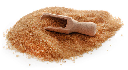 Brown sugar with wooden scoop