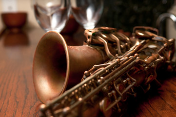 Saxophone and Glasses on a Bar