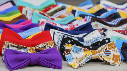 Close-up of colorful bow ties for hipsters, creative subculture. Vivid picturesque backdrop for...