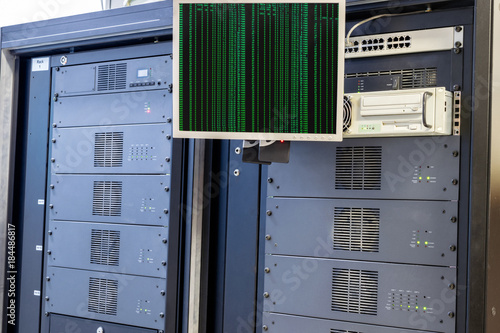 Servers Computer And Monitor Installed In A Rack In A Data