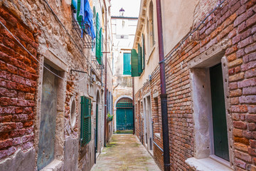 Fototapeta na wymiar Colorful street in Venice, Italy