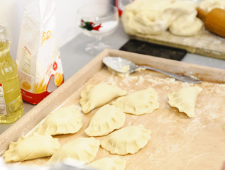 raw dumplings are waiting for cooking