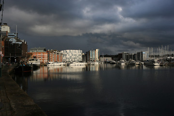Fototapeta premium Ipswich waterfront marina with storm clouds