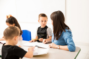 Boy paying attention to teacher