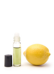 Lemon Essential Oil in a Container on a White Background