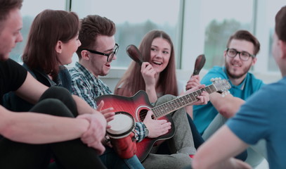 group of students rehearsing a musical number for the contest