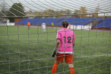 rear view of soccer goalkeeper