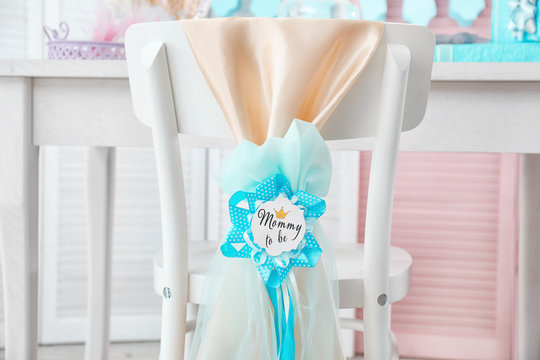 Chair decorated with award ribbon, indoors