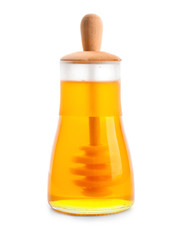 Jar of honey with dipper, isolated on white