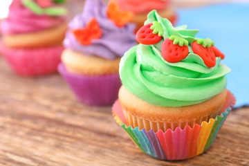 Beautifully decorated cupcake on table, closeup