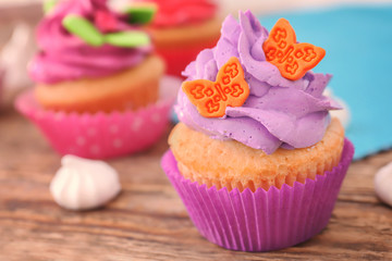 Beautifully decorated cupcake on table, closeup