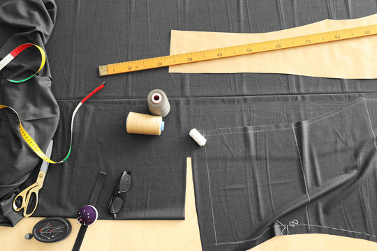 Composition with sewing accessories on table, top view