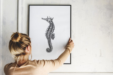Photo of hand drawing seahorse is hanging on the wall © Rawpixel.com