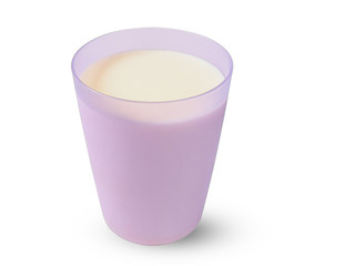 Milk in a violet plastic cup isolated on white background