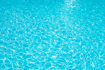Beautiful ripple wave and blue water surface in swimming pool, Blue water for background and...