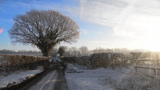 country lane winter morning sunrise snow frost mist - Staffordshire, England: December 2017