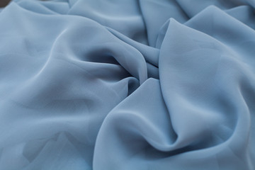 Color blue textil, silk fabric with pleats