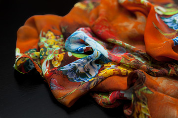 Color orange textil, silk fabric with pleats