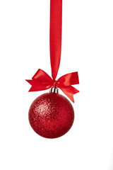 Red christmas ball with red bow over white